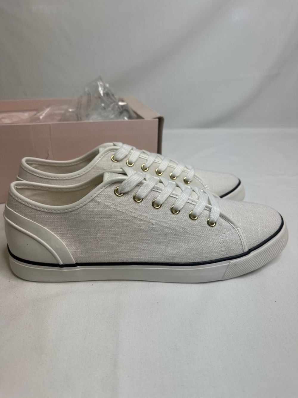 JustFab White Low-Top Canvas Sneakers with Gold Eyelets and Black Trim